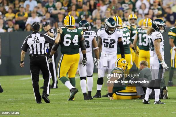 Green Bay Packers offensive guard Don Barclay gets medical attention during a football game between the Green Bay Packers and the Philadelphia Eagles...