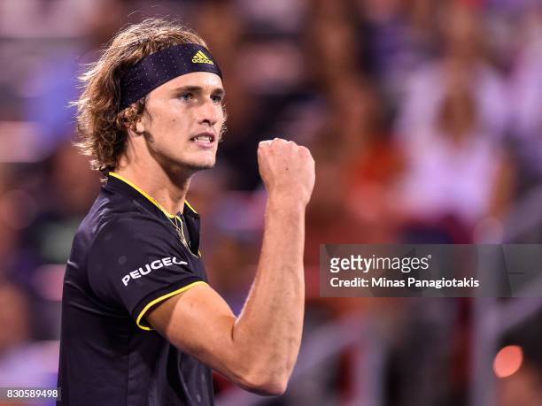 Alexander Zverev of Germany reacts after winning the first set against Kevin Anderson of South Africa during day eight of the Rogers Cup presented by...