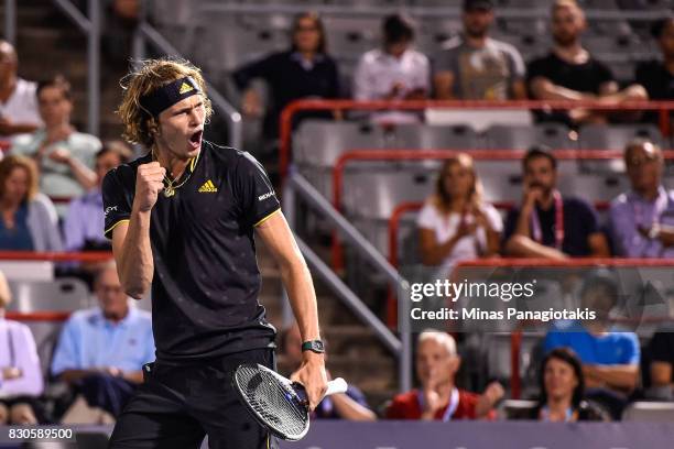 Alexander Zverev of Germany reacts after winning the first set against Kevin Anderson of South Africa during day eight of the Rogers Cup presented by...