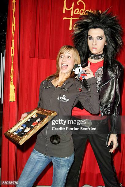 Tokio Hotel fan Jennifer poses with Bill Kaulitz wax figure at Madame Tussauds on September 30, 2008 in Berlin, Germany.