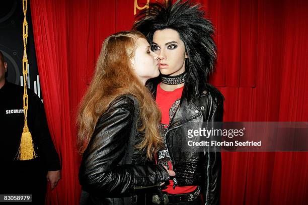 Tokio Hotel fan poses with Bill Kaulitz wax figure at Madame Tussauds on September 30, 2008 in Berlin, Germany.