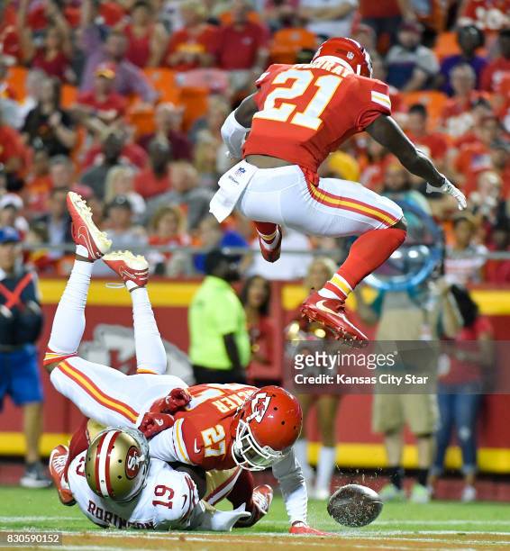 Kansas City Chiefs cornerback Kenneth Acker breaks up a pass intended for San Francisco 49ers wide receiver Aldrick Robinson as defensive back Eric...