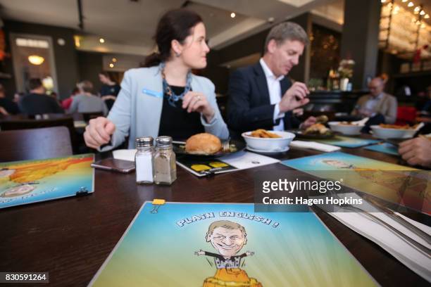 Prime Minister Bill English andf Wellington Central candidate Nicola Willis taste test the 'Bill English Burger' at The Backbencher gastropub on...