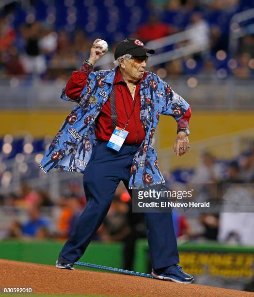 Marvel legend and artist Allen Bellman throws the ceremonial first pitch as the Miami Marlins play host to the Colorado Rockies while celebrating...