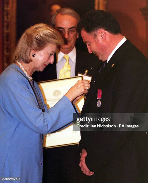 Princess Alexandra, President of the Royal Humane Society, presents the Society's Stanhope Gold Medal 2000, to David Calnan, from Yukon, Canada, at a...