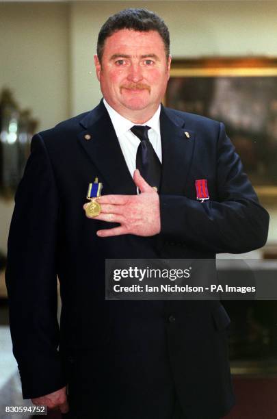 David Calnan, from Yukon, Canada, shows off the Royal Humane Society Stanhope Gold Medal 2000, presented to him by HRH Princess Alexandra, at a...