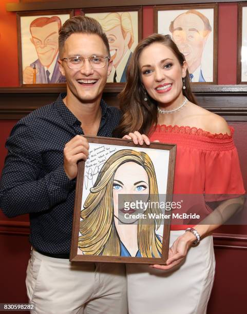 Nathan Johnson and Laura Osnes during the Corey Cott Sardi's Portrait unveiling at Sardi's Restaurant on August 11, 2017 in New York City.