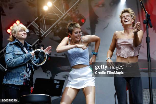 Sarah Martin of Belle & Sebastian performs on the Sutro Stage while festivalgoers dance at 2017 Outside Lands Music And Arts Festival at Golden Gate...