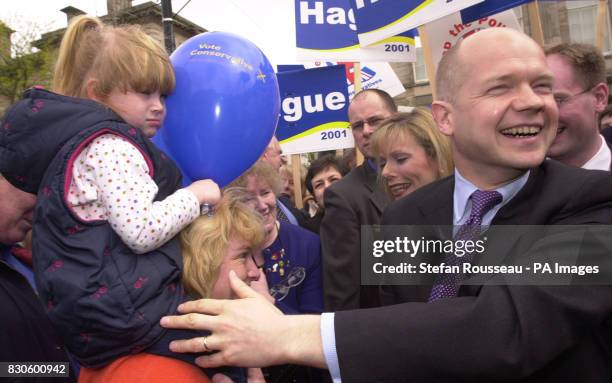 Leader of the Opposition William Hague and his wife Ffion take a walkabout in the Market Square in Stafford , where Mr Hague launched his manifesto...