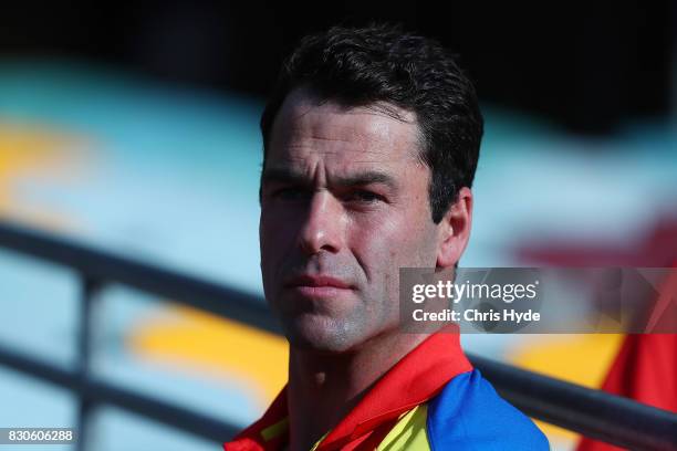 Suns interim Coach Dean Solomon looks on before the round 21 AFL match between the Brisbane Lions and the Gold Coast Suns at The Gabba on August 12,...