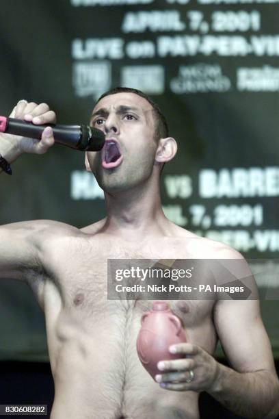 British boxer Prince Naseem Hamed shouts to the crowd during the weigh-in ahead of the IBO featherweight title fight on 7/4/01 in Las Vegas, against...