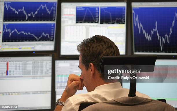 Trader looks on during a trading session on the floor of Frankfurt stock exchange on September 30, 2008 in Frankfurt am Main, Germany. Due to the...