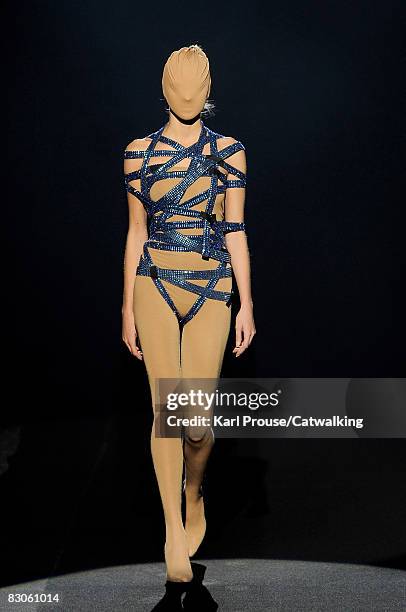 Model walks the runway during the Maison Martin Margiela show part of Paris Fashion Week Spring/Summer 2009 on September 29,2008 in Paris,France.