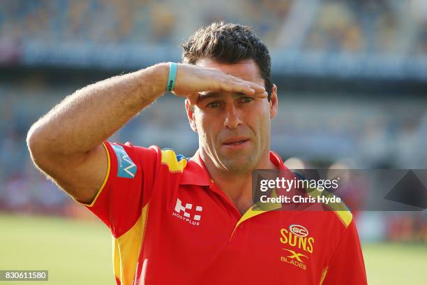 Suns interim Coach Dean Solomon looks on before the round 21 AFL match between the Brisbane Lions and the Gold Coast Suns at The Gabba on August 12,...