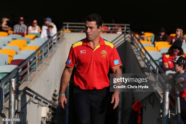 Suns interim Coach Dean Solomon looks on before the round 21 AFL match between the Brisbane Lions and the Gold Coast Suns at The Gabba on August 12,...