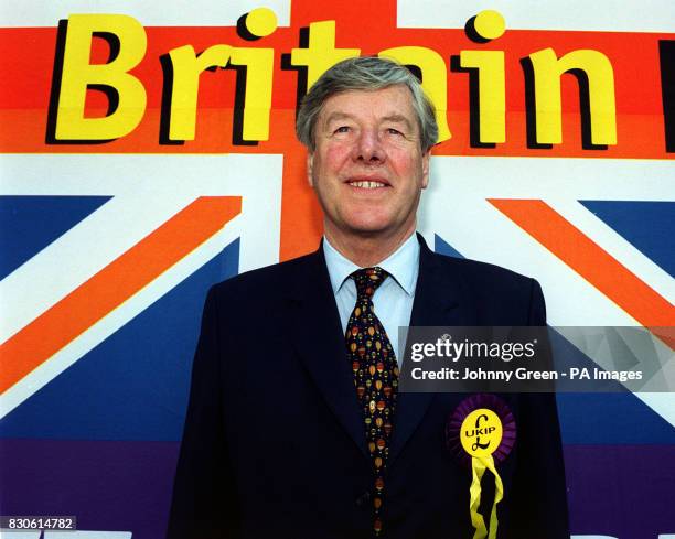 Independence Party leader Jeffrey Titford, by a poster for the party outside the Methodist Central Hall in central London, where the UKIP was holding...
