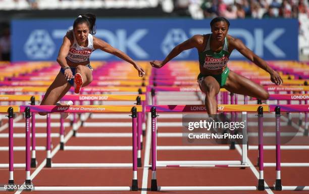 Lindsay Lindley of Nigeria and Elisávet Pesirídou of Grecee compete in the heats of 100 meter hurdles in London at the 2017 IAAF World Championships...