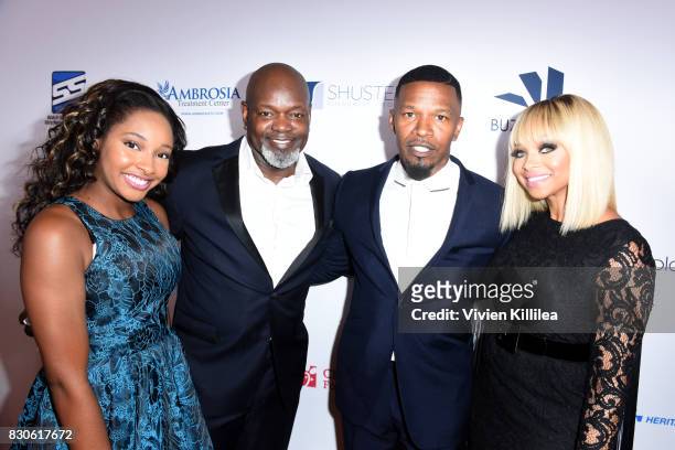 Skylar Smith, Emmitt Smith, Jamie Foxx and Patricia Southall attend the 17th Annual Harold & Carole Pump Foundation Gala at The Beverly Hilton Hotel...