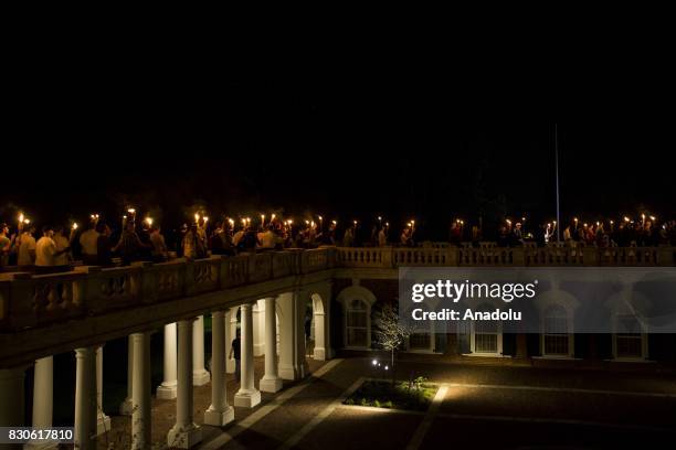 Neo Nazis, Alt-Right, and White Supremacists march through the University of Virginia Campus with torches in Charlottesville, Va., USA on August 11,...