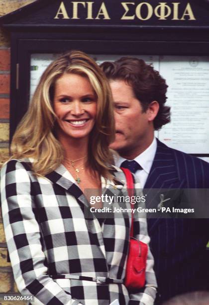 Australian supermodel Elle MacPherson arrives at the christening of nine month old Prince Achileas of Greece. Princess Caroline of Monaco and her...