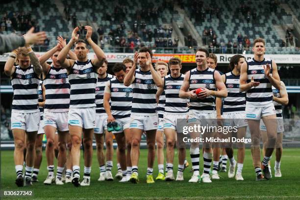 Cats players celebrates the win during the round 21 AFL match between the Geelong Cats and the Richmond Tigers at Simonds Stadium on August 12, 2017...