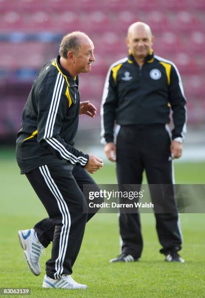 Manager Luiz Felipe Scolari is watched by assistant Ray Wilkins during the Chelsea training session ahead of their Group A UEFA Champions League...