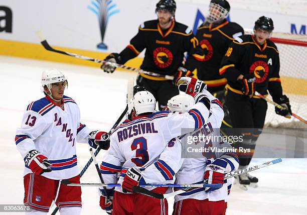 Wade Redden of Rangers is celebrating with his team mates his 2:0 goal during the Victoria Cup game between NY Rangers and SC Bern at the PostFinance...