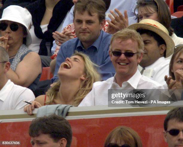 Broadcaster Chris Evans and his wife pop singer Billie Piper during the Stella Artois Championships at the Queens Club in London.