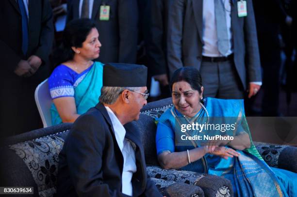 Prime Minister Sher Bahadur Deuba and External Affairs Minister of India Sushma Swaraj talks with each other during reception at India House to mark...