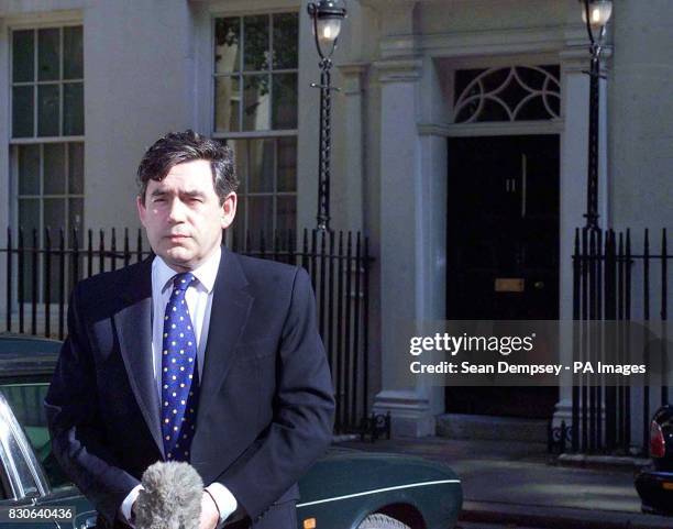 Chancellor Gordon Brown outside 11 Downing Street in London. The Chancellor along with Trade and Industry Secretary Patricia Hewitt and Education and...