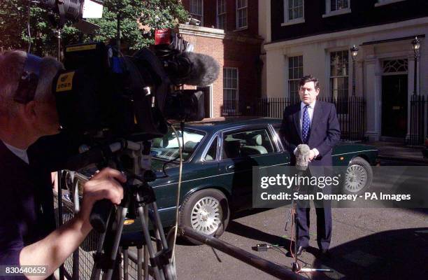 Chancellor Gordon Brown outside 11 Downing Street, London. The Chancellor, along with Trade and Industry Secretary Patricia Hewitt and Education and...
