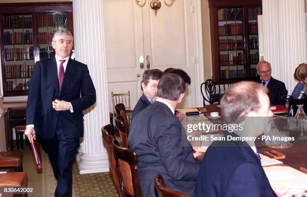 Foreign Secretary Jack Straw walks to his seat to join other members of Prime Minister Tony Blair's cabinet meeting in 10 Downing Street. * Leader of...