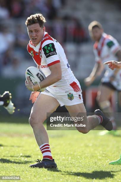 Kurt Mann of the Dragons runs the ball during the round 23 NRL match between the St George Illawarra Dragons and the Gold Coast Titans at UOW Jubilee...