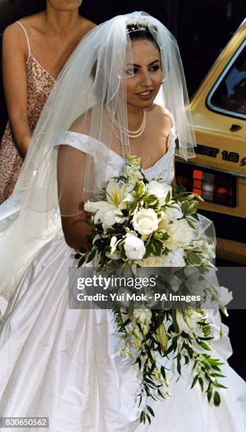 Kheira Bourahla arrives at her wedding to Julian Lloyd Webber in Kensington, London. The 50-year cellist and brother of millionaire composer Andrew,...