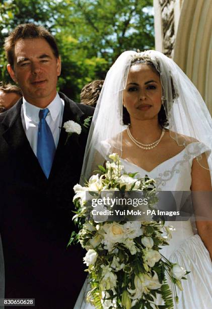 Julian Lloyd Webber and Kheira Bourahla at their wedding in Kensington, London. The 50-year cellist and brother of millionaire composer Andrew, was...