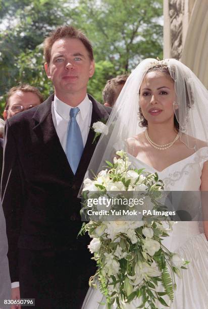 Julian Lloyd Webber and Kheira Bourahla at their wedding in Kensington, London. The 50-year cellist and brother of millionaire composer Andrew, was...