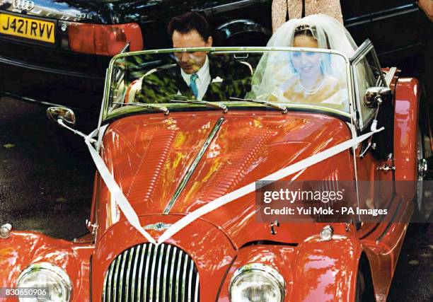 Julian Lloyd Webber and Kheira Bourahla at their wedding in Kensington, London. The 50-year cellist and brother of millionaire composer Andrew, was...