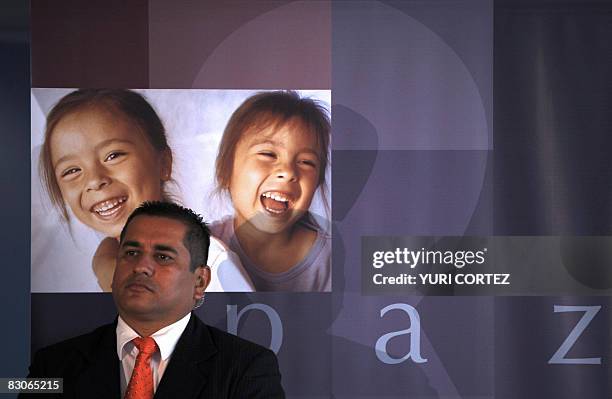 Presidential bodyguard stands near to a banner during the opening ceremony of the seminar "Alliance of Civilizations" on September 30, 2008. The...