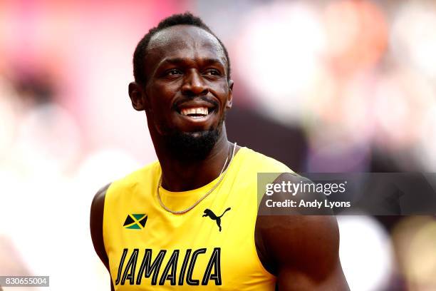 Usain Bolt of Jamaica reacts after competing in the Men's 4x100 Metres Relay heats during day nine of the 16th IAAF World Athletics Championships...