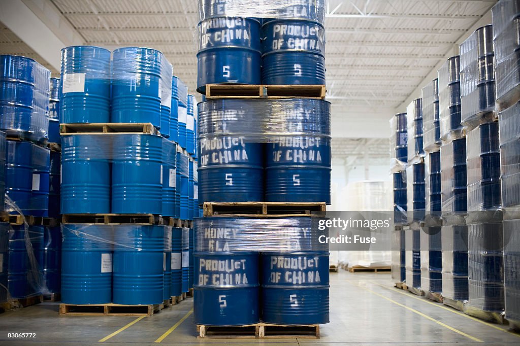 Stacks of Barrels in a Warehouse