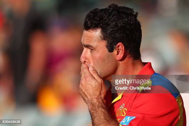 Suns interim Coach Dean Solomon looks on before the round 21 AFL match between the Brisbane Lions and the Gold Coast Suns at The Gabba on August 12,...