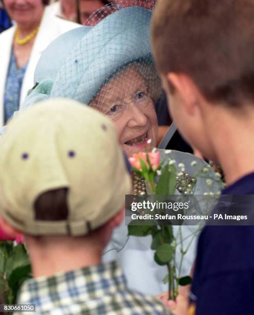 Queen Elizabeth the Queen Mother arrives at the Sandringham Flower Show in Norfolk only days before her 101st birthday.