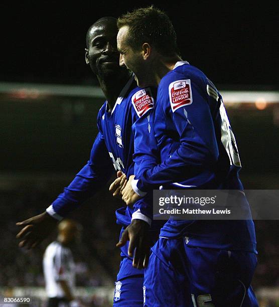 Owusu-Abeyie Quincy of Birmingham celebrates his goal with James McFaden during the Coca-Cola Championship match between Derby County and Birmingham...