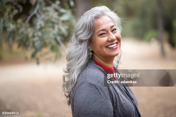 beautiful mexican woman with white hair - womens issues stock pictures, royalty-free photos & images