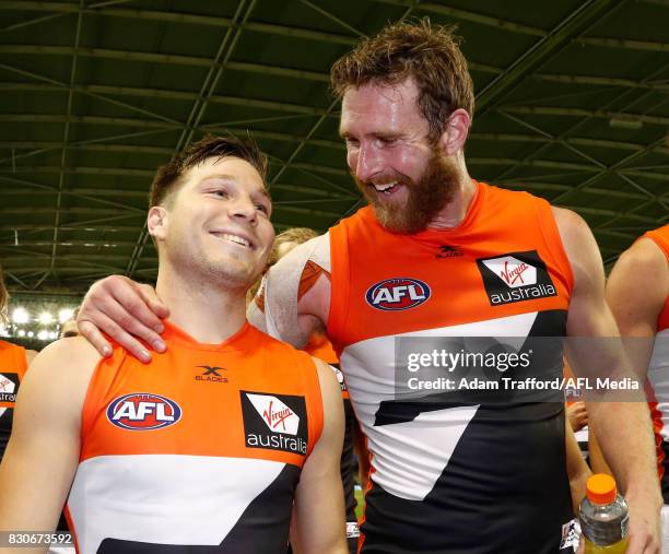 Toby Greene of the Giants celebrates with Dawson Simpson of the Giants during the 2017 AFL round 21 match between the Western Bulldogs and the GWS...