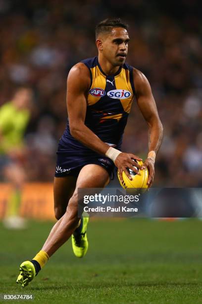 Lewis Jetta of the Eagles looks to pass the ball during the round 21 AFL match between the West Coast Eagles and the Carlton Blues at Domain Stadium...