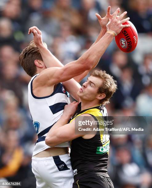 David Astbury of the Tigers spoils Rhys Stanley of the Cats during the 2017 AFL round 21 match between the Geelong Cats and the Richmond Tigers at...