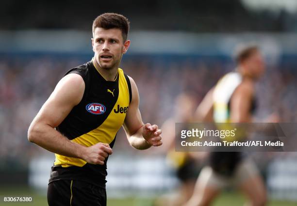 Trent Cotchin of the Tigers looks on during the 2017 AFL round 21 match between the Geelong Cats and the Richmond Tigers at Simonds Stadium on August...