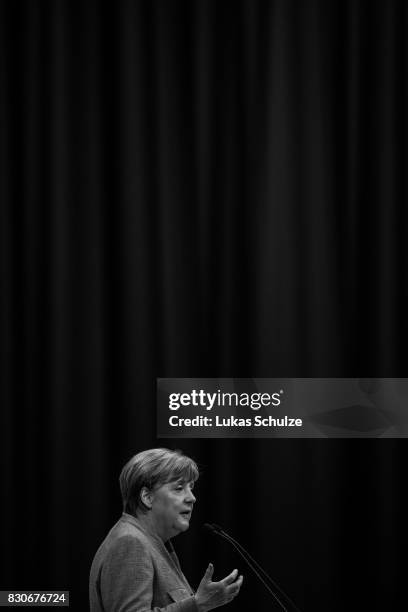German Chancellor and head of the German Christian Democrats Angela Merkel speaks at the CDU federal election campaign opening rally on August 12,...