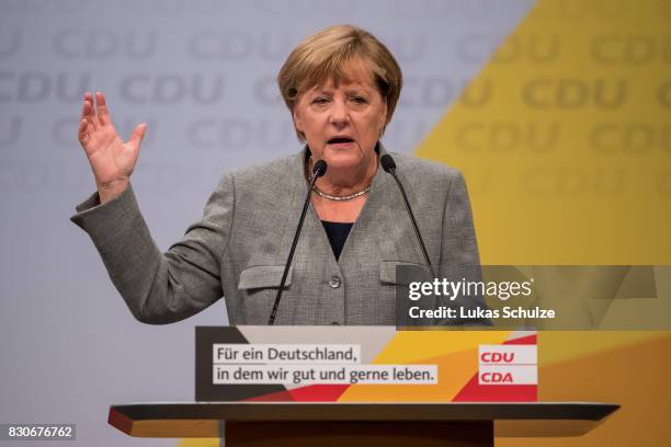 German Chancellor and head of the German Christian Democrats Angela Merkel greets supporters at the CDU federal election campaign opening rally on...